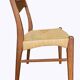 wooden and straw chairs from the 50s