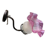 Metal wall lamp with frosted glass shade in the shape of a pink corolla