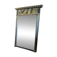 Large Empire-style mirror in dark green painted wood and gilded stucco.