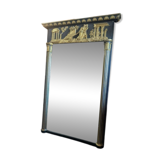 Large Empire-style mirror in dark green painted wood and gilded stucco.