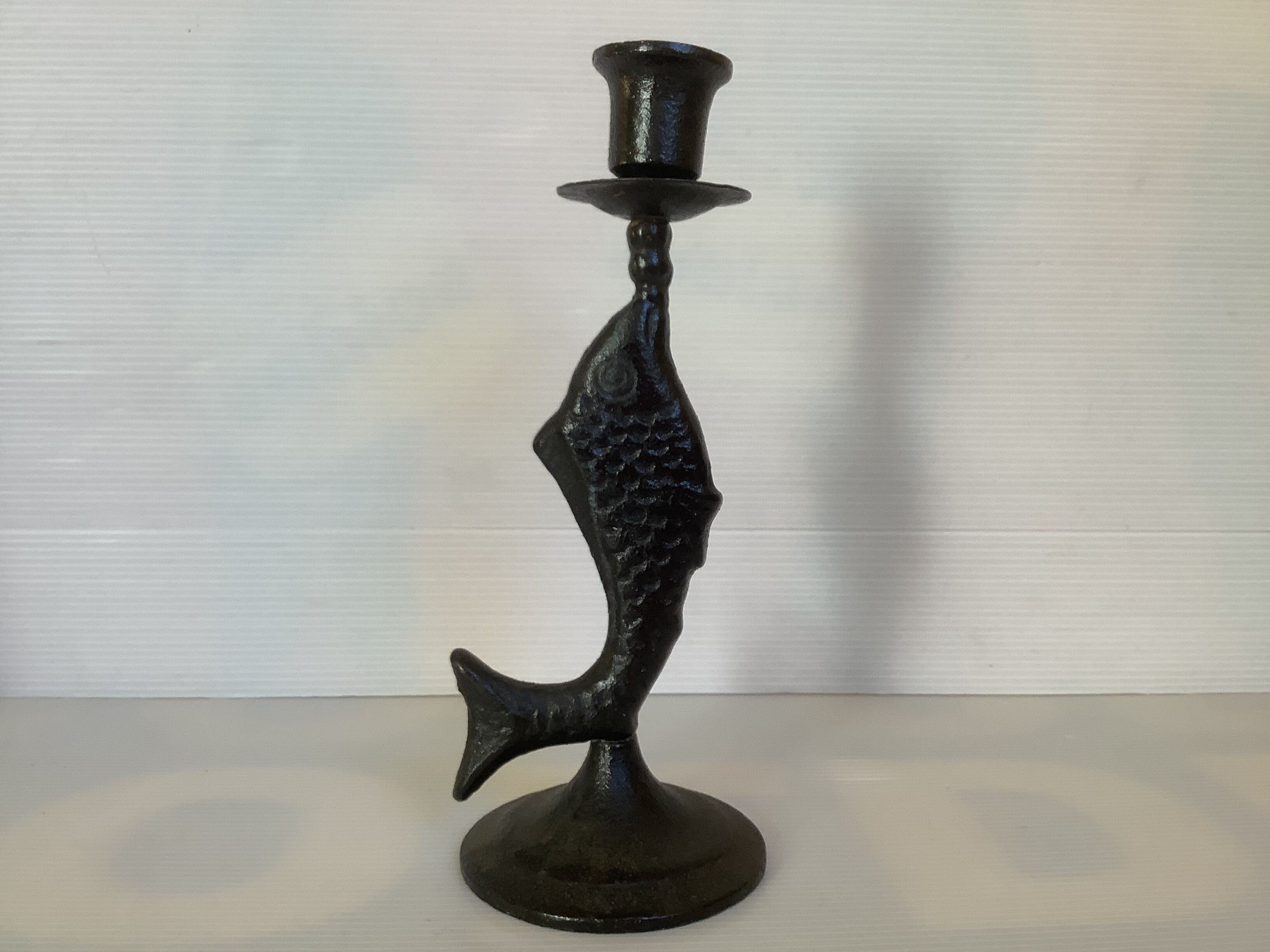 Brutalist black cast iron fish candle holder