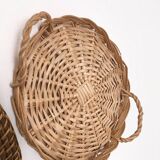 Wall composition of seven baskets and wicker trays