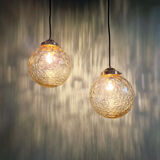Pair of amber bubble glass pendant lights, 1970s