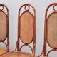 Lot de quatre chaises Thonet anciennes en hêtre cintré teinté acajou, Vienne, XXe siècle