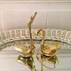 Couple of brass swans