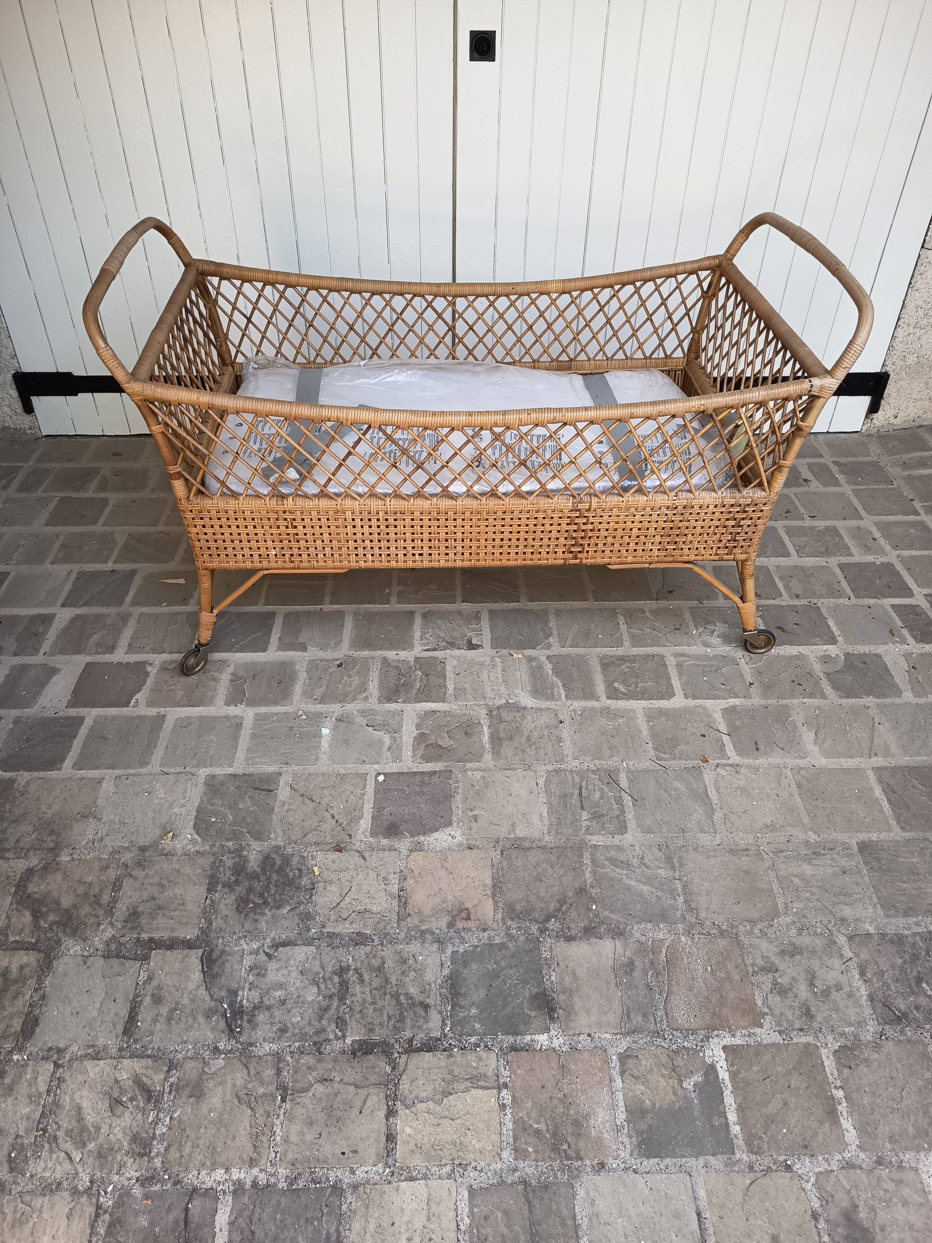 Vintage rattan cradle