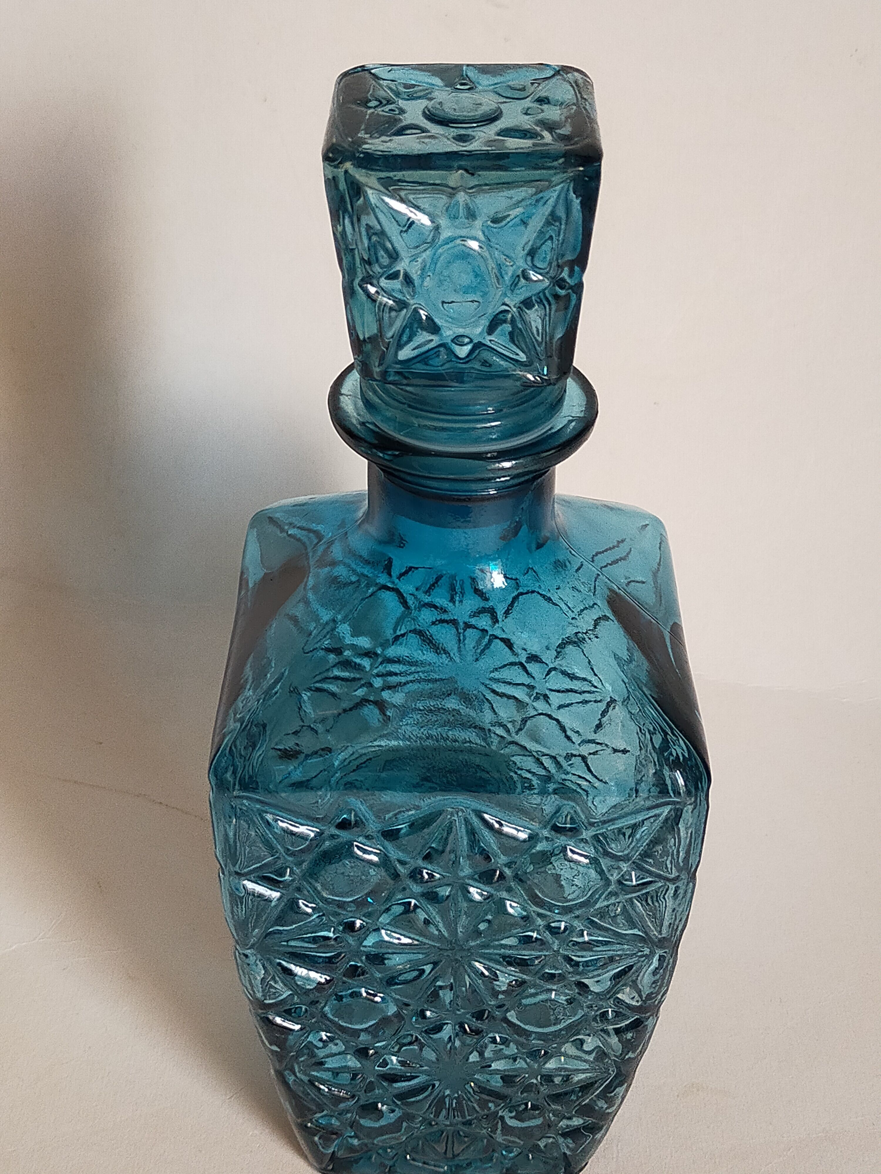 Vintage blue glass whiskey decanter