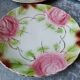 Series of 6 plates in slip decorated with roses