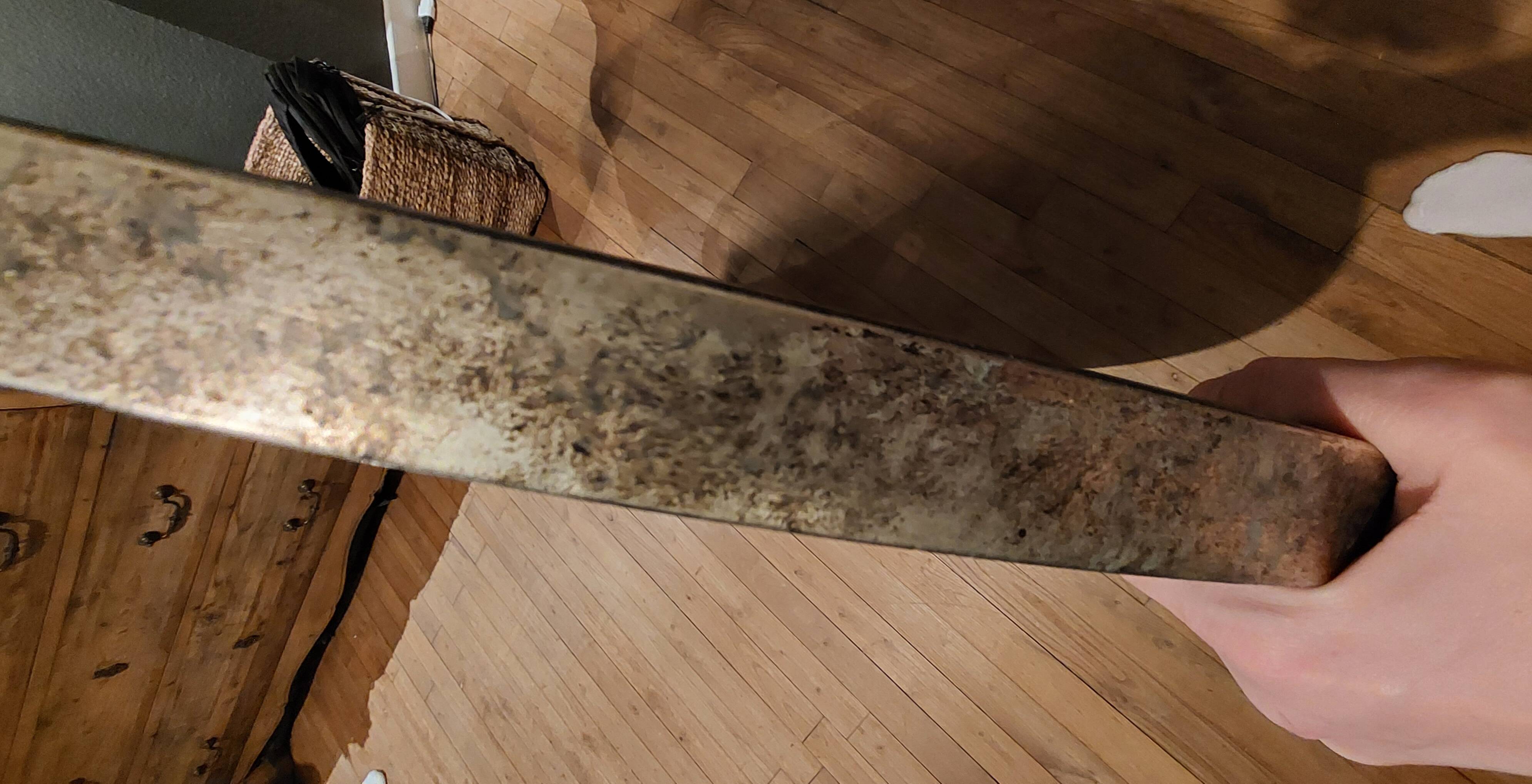 Round patinated mirror