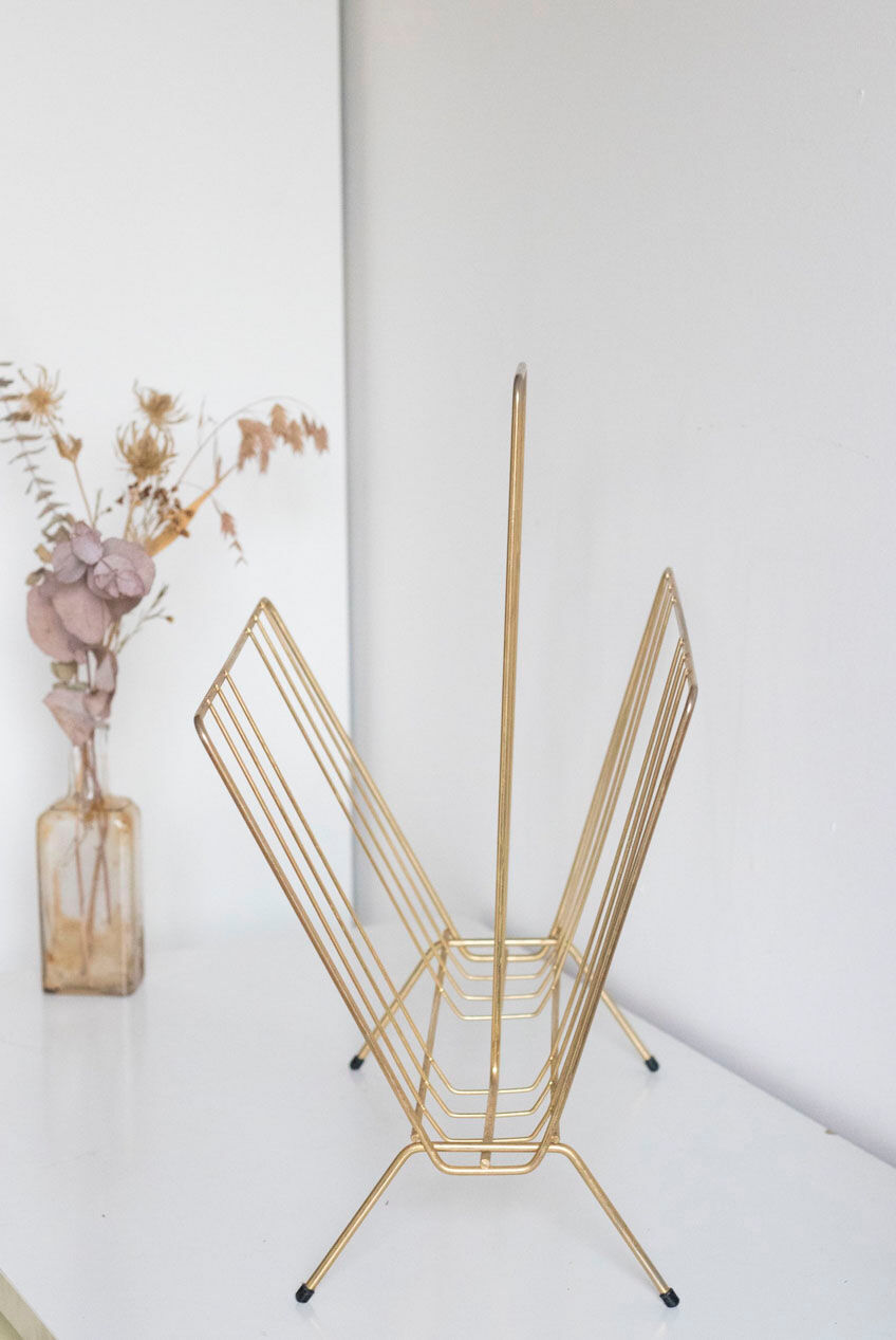 Vintage magazine holder in gold metal