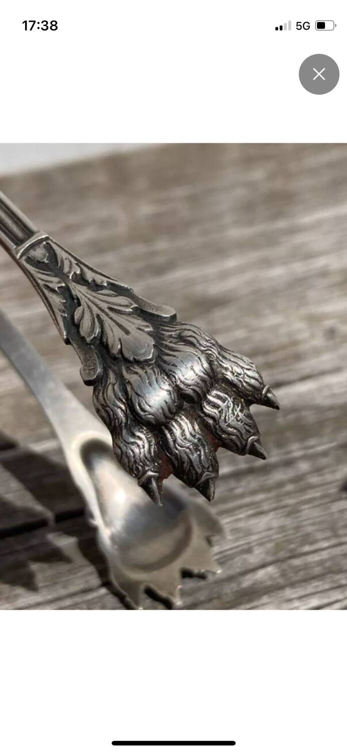 Solid silver sugar tongs