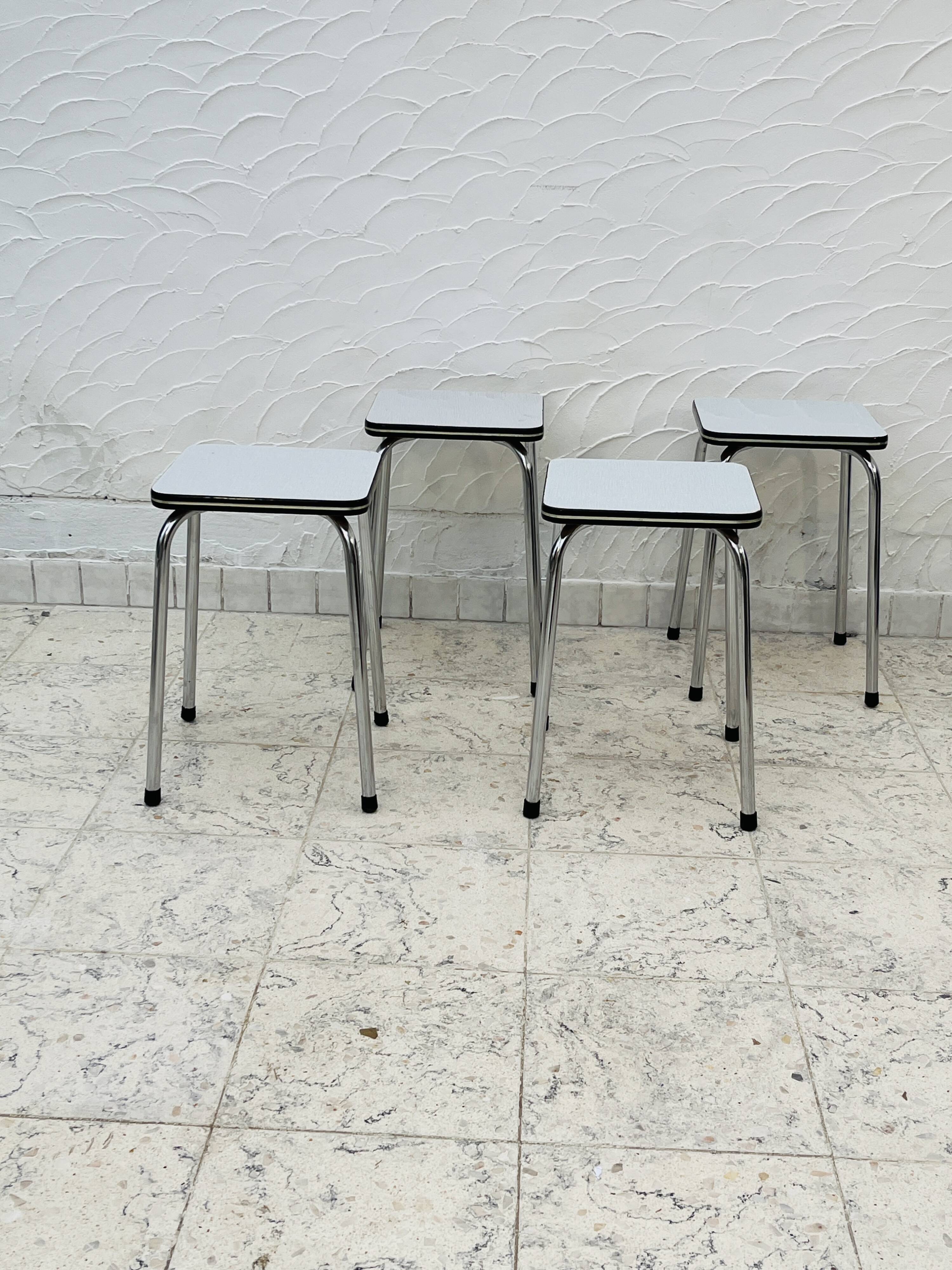Set of 4 vintage grey chrome Formica stools.