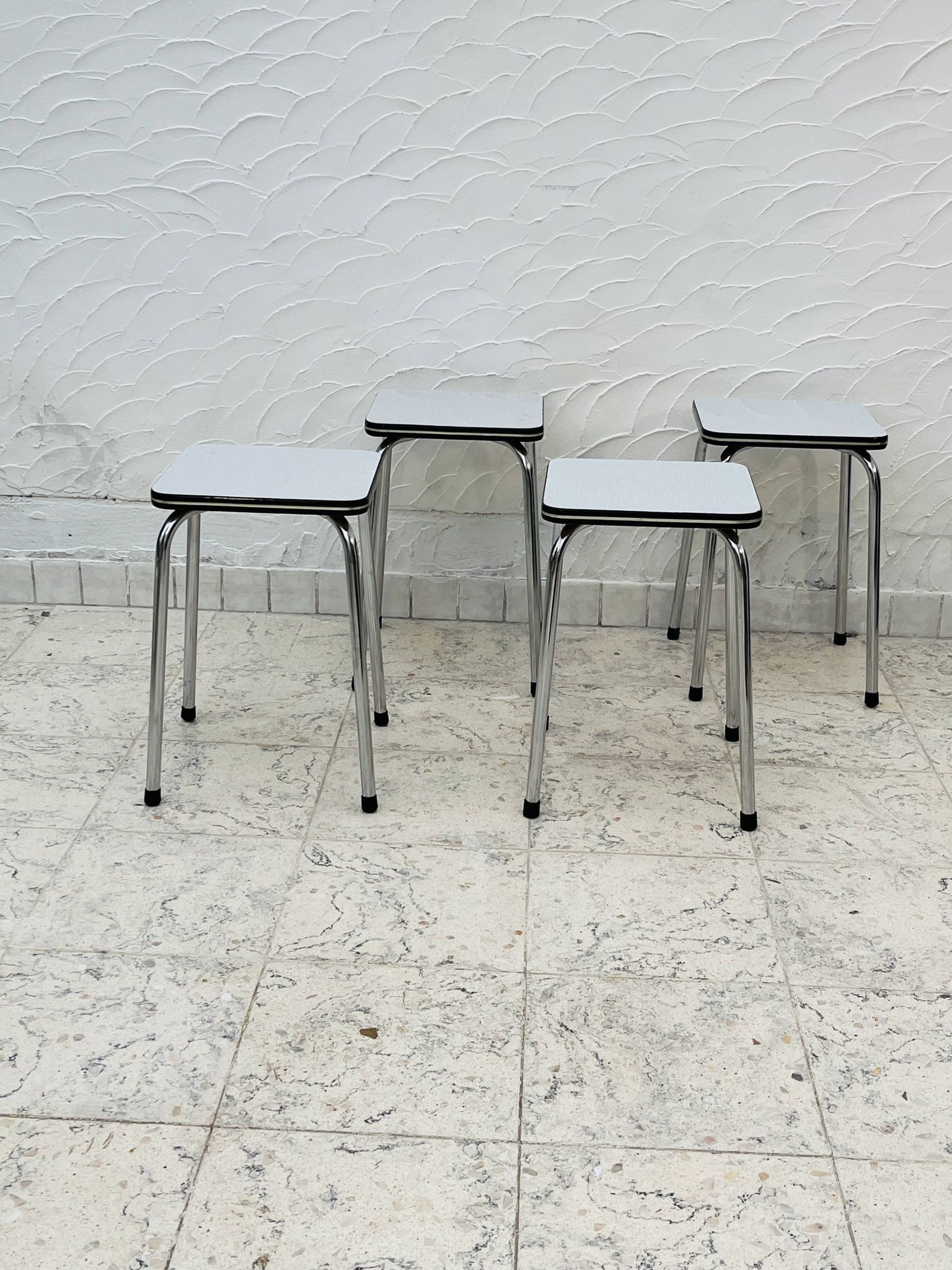 Set of 4 vintage grey chrome Formica stools.