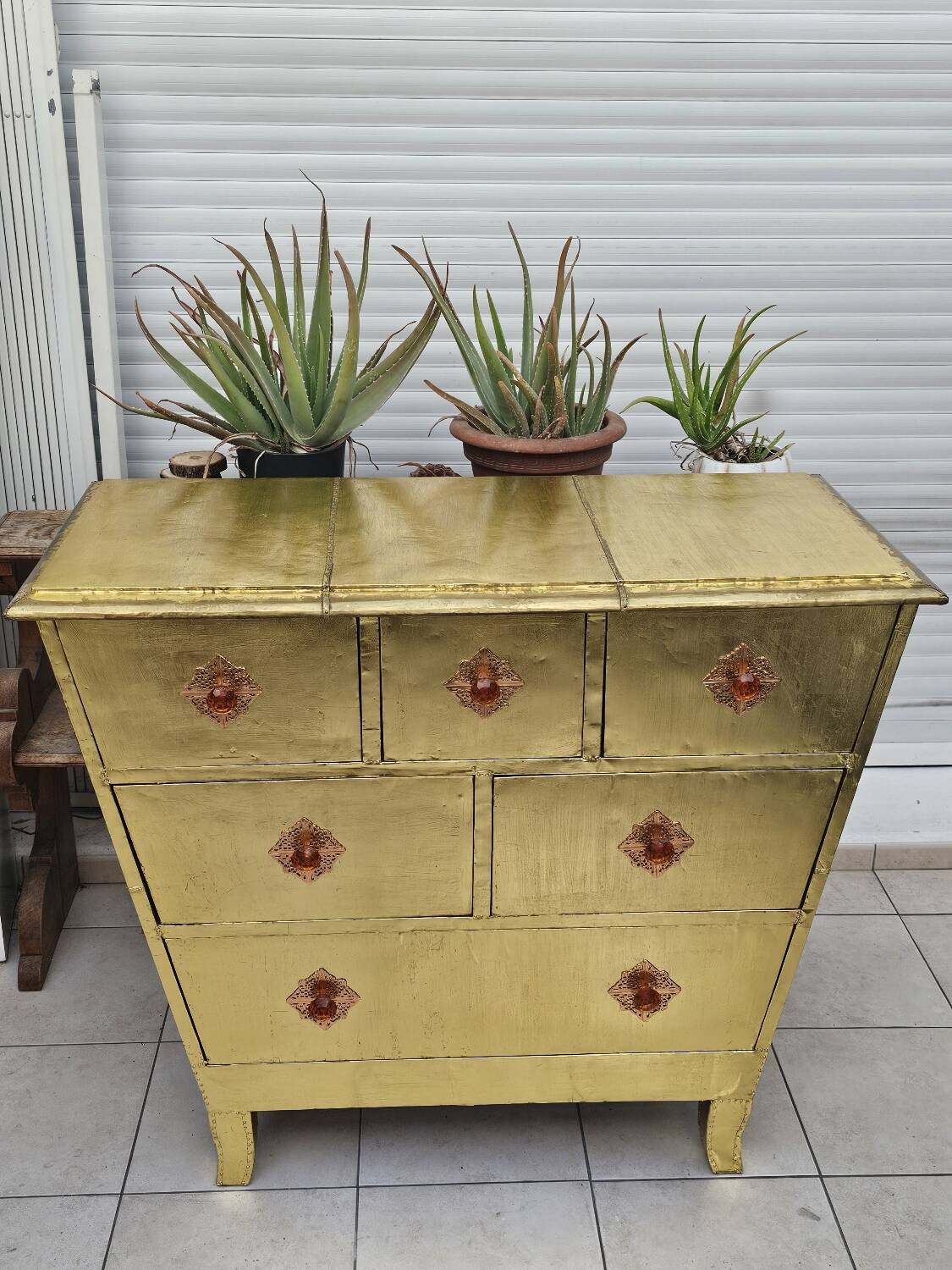 Handcrafted commode fully dressed in brass, original piece and