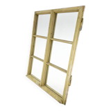 Vintage wooden window converted to a mirror
