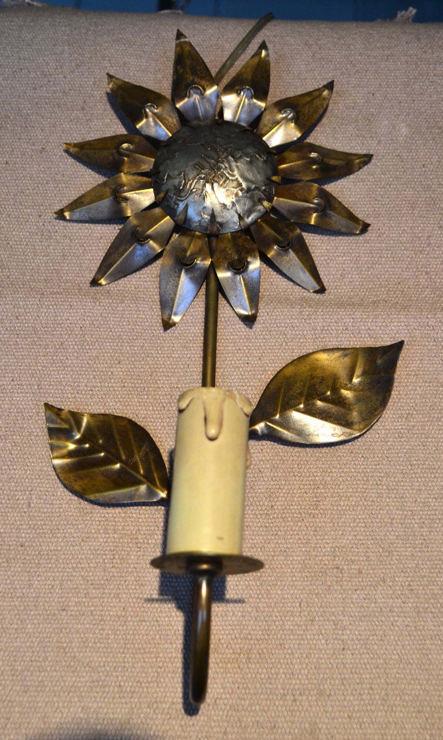 Brass flower wall light from the 1970s.