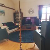 Wood and metal floor lamp, halogen type but with LED bulb, tilting lampshade.
