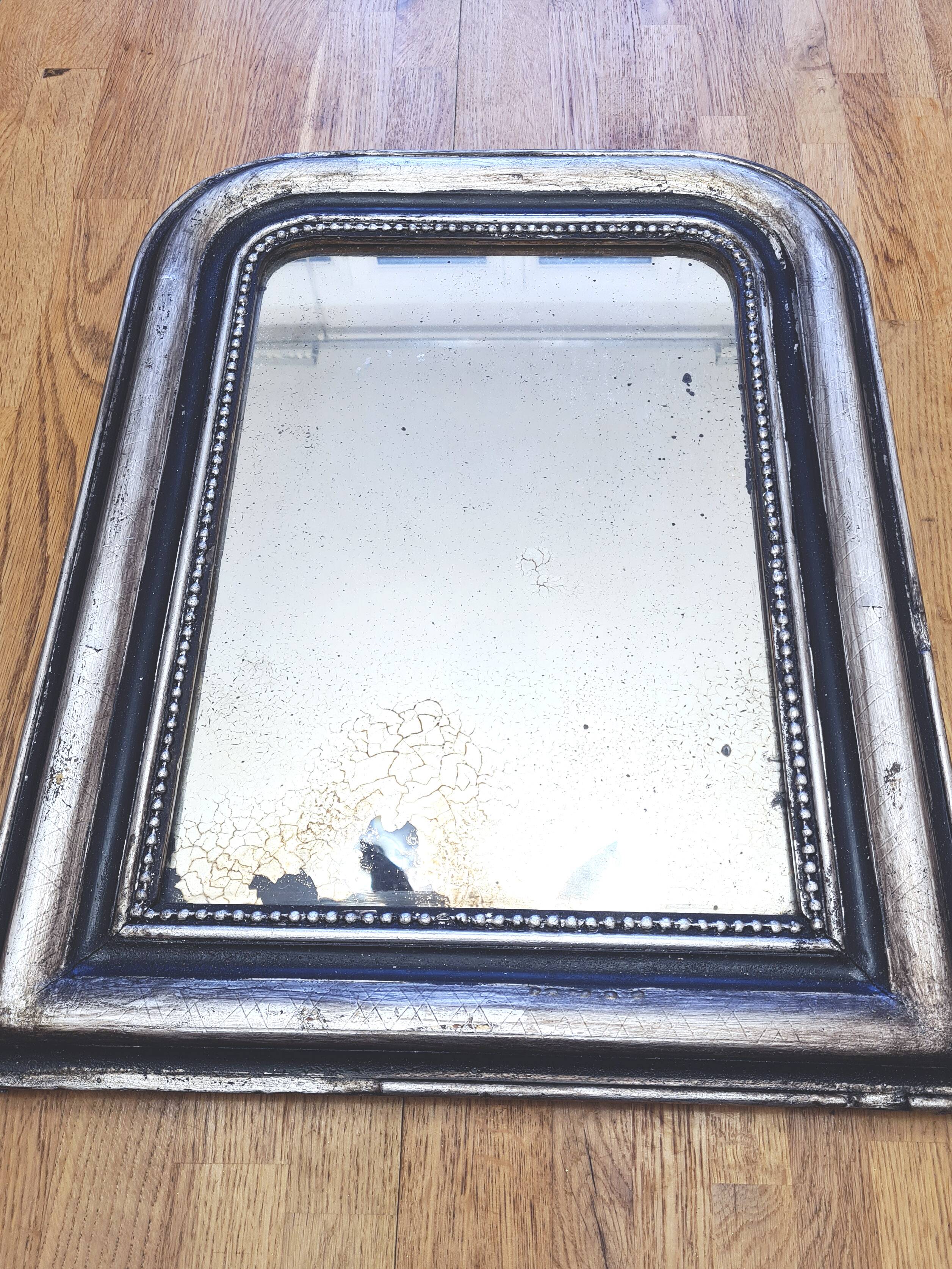 Old Louis Phillipe mirror, silvered with silver leaf.