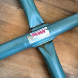 Wooden stool with metal tubes