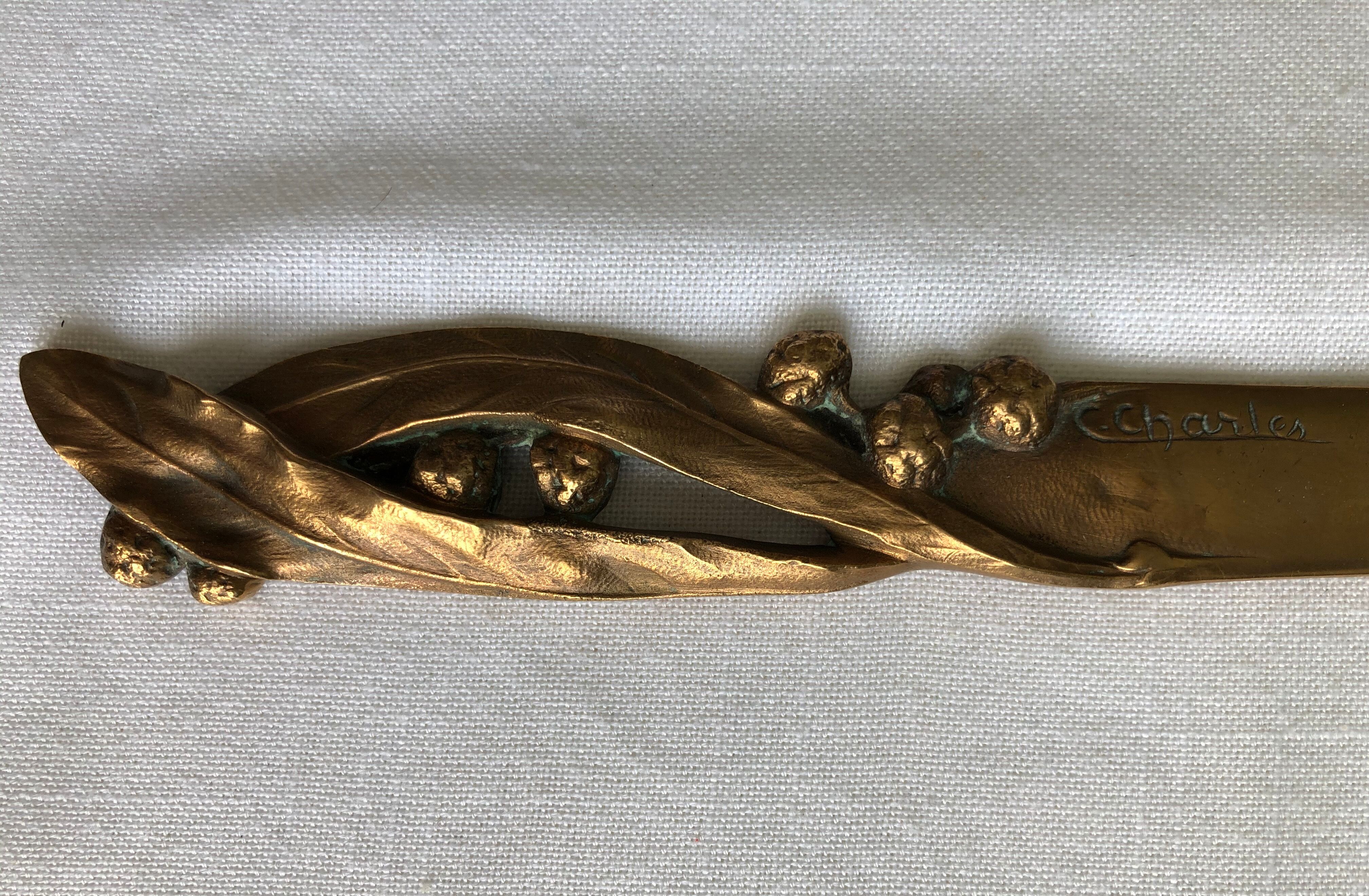 Opens letters cut bronze paper signed