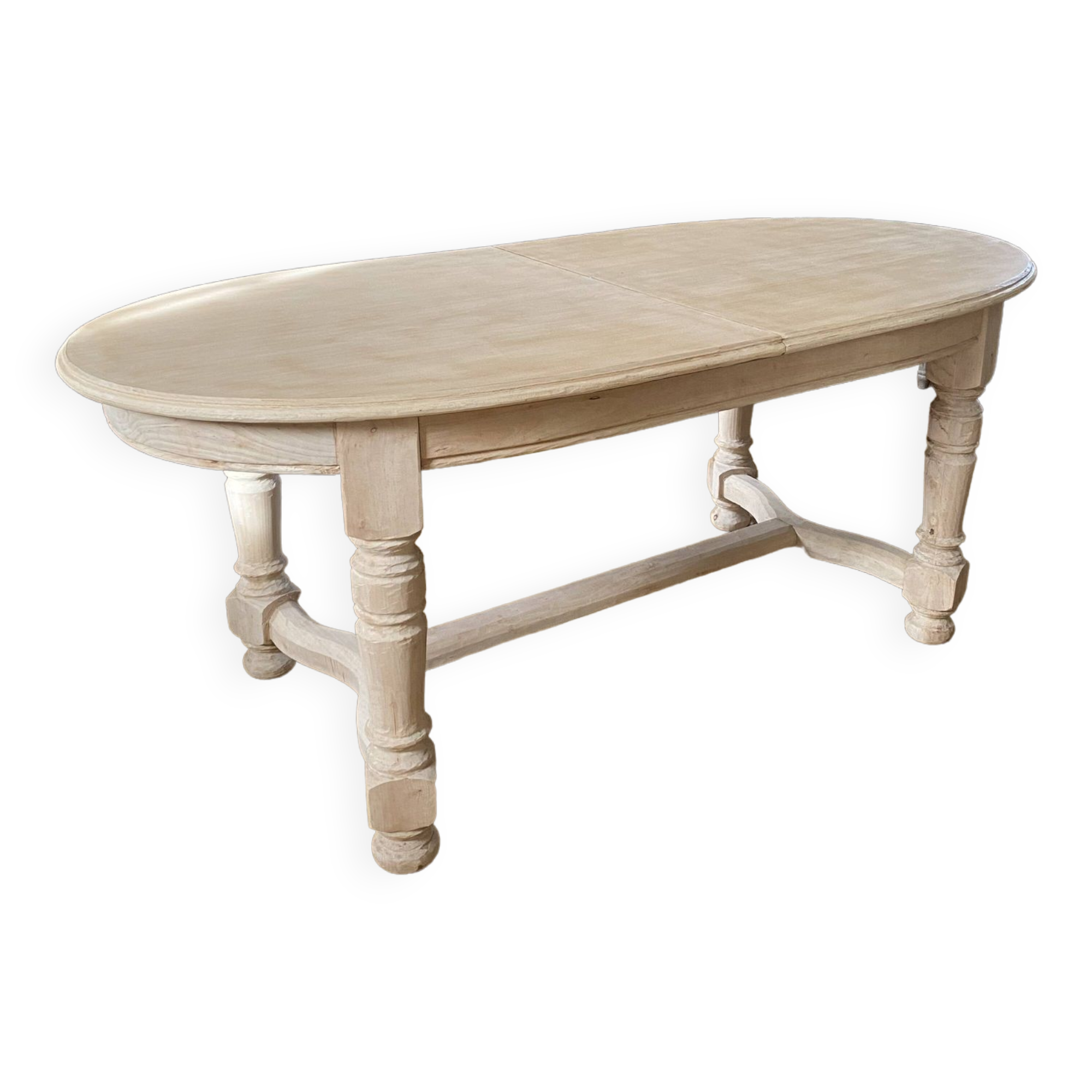 Oval table with integrated extension