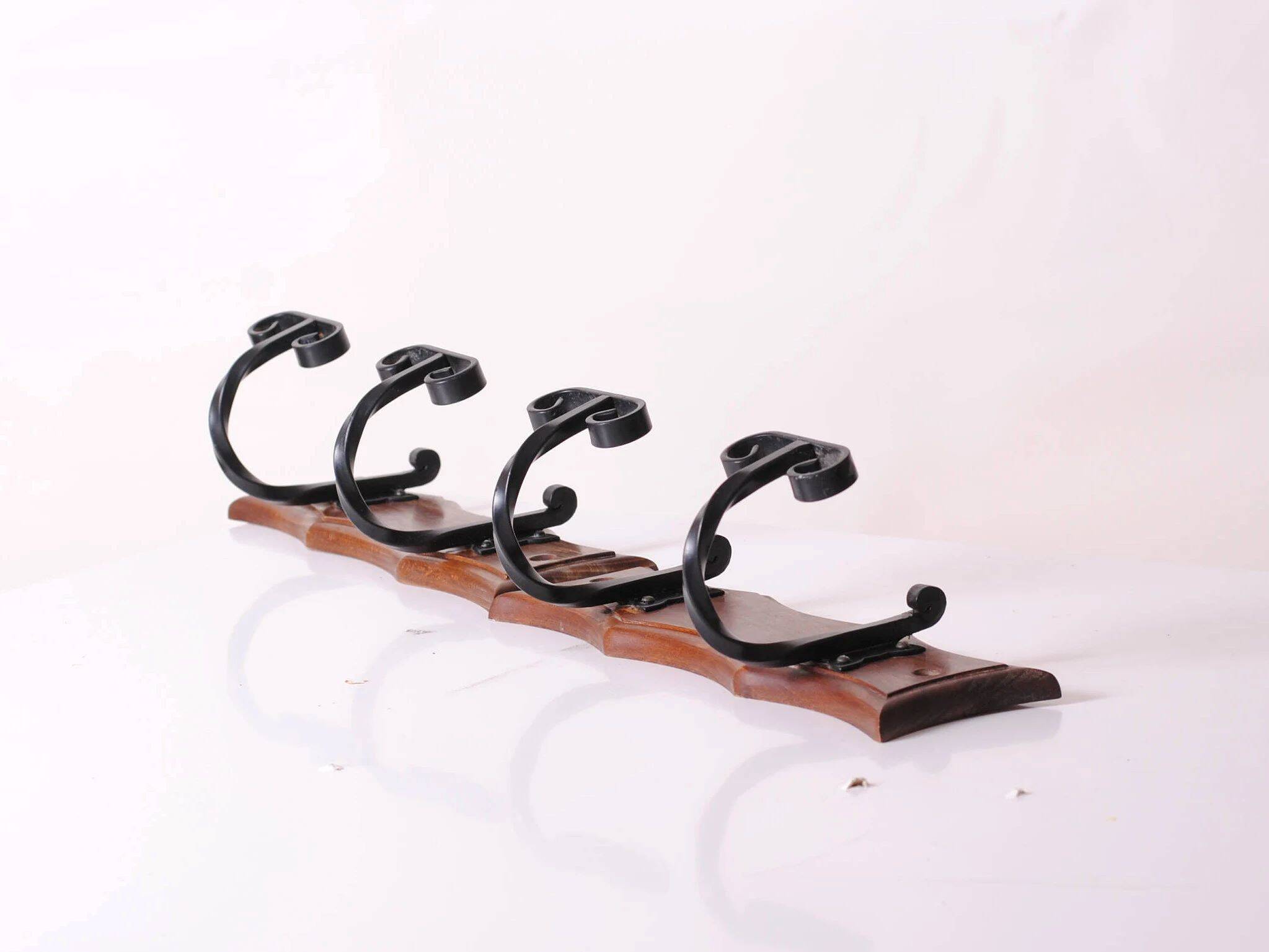 wood and wrought iron coat racks, set of two