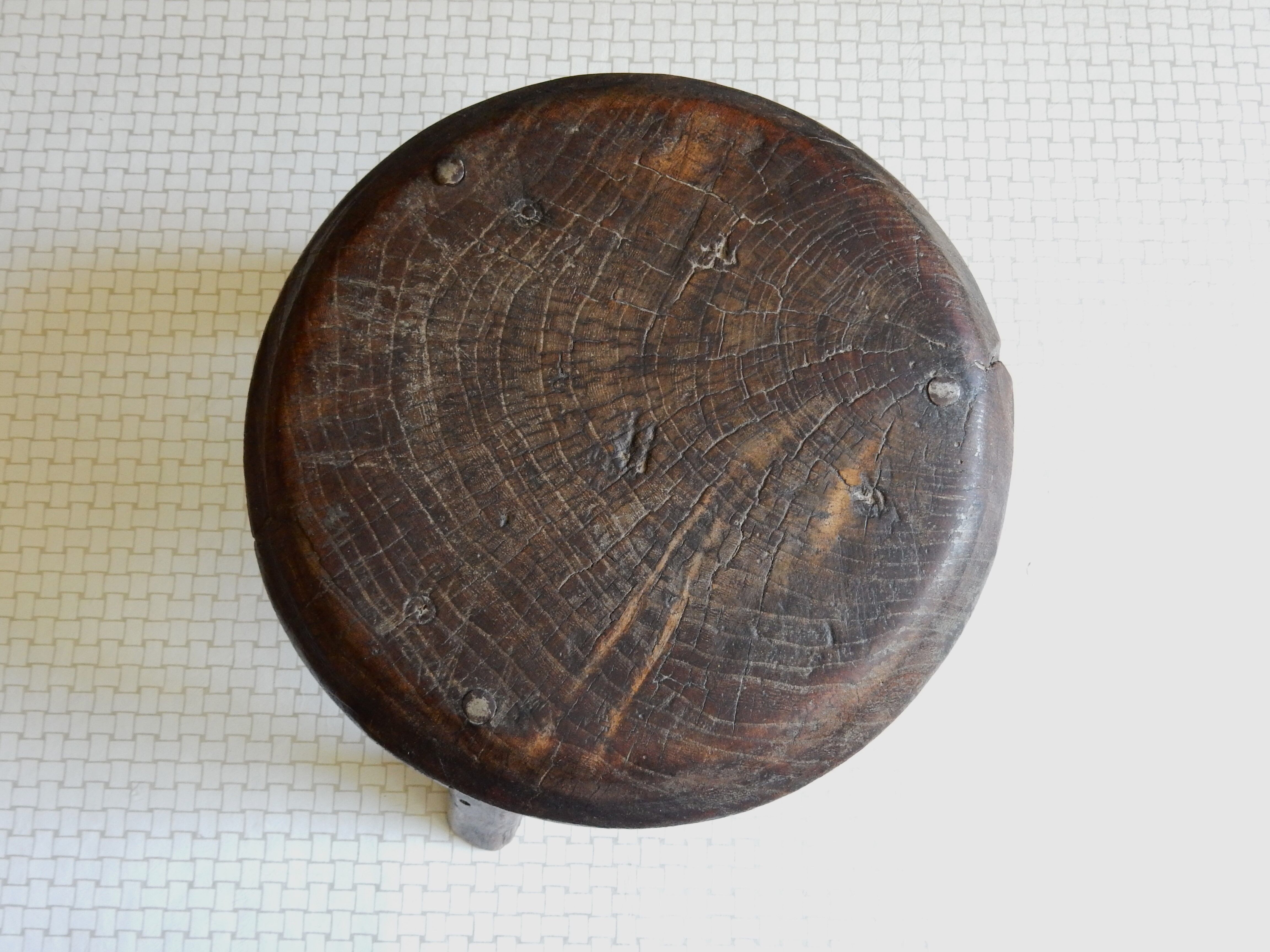 Small wooden farm tripod stool