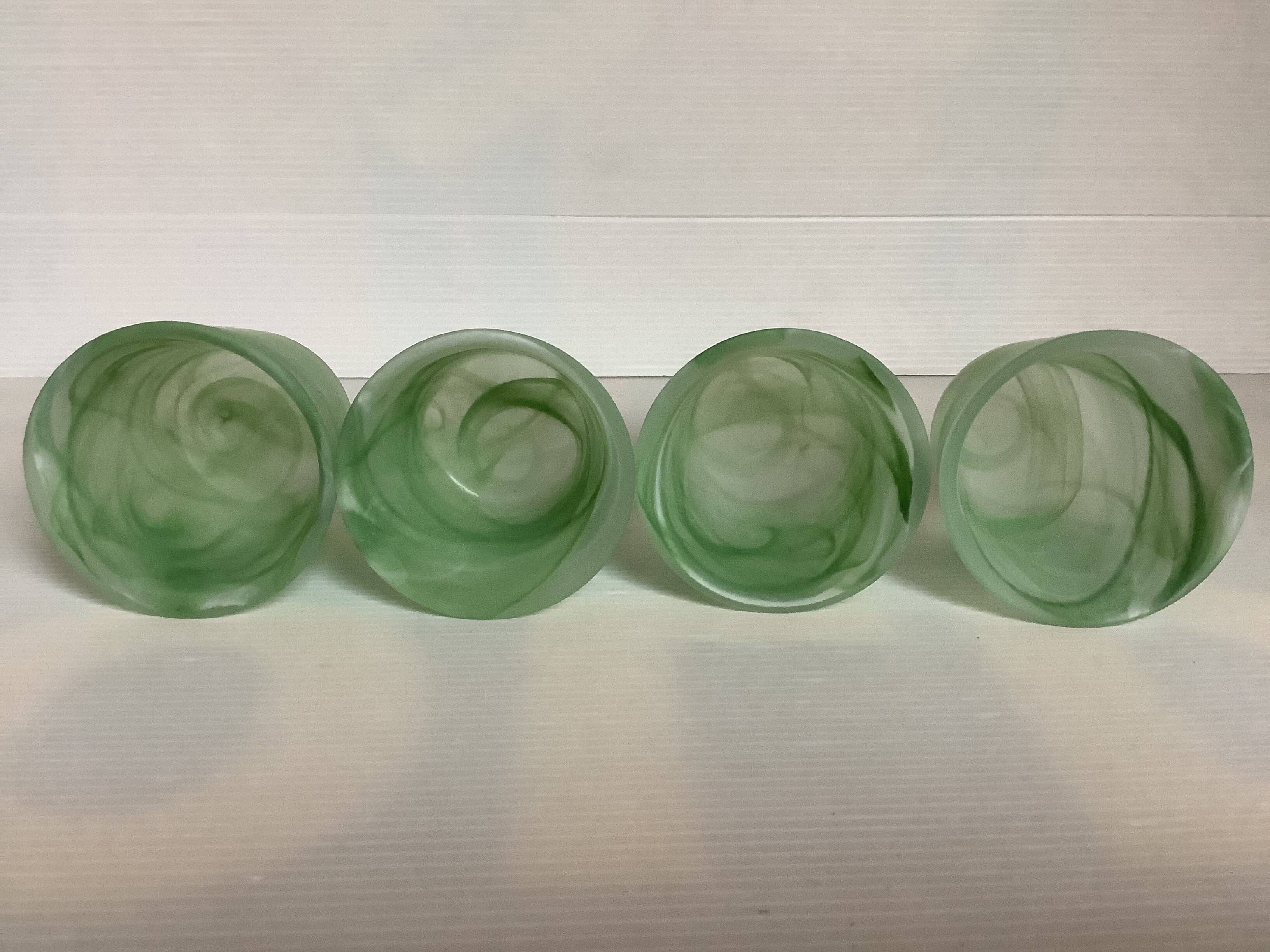 Four green glass paste candle holders