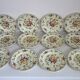 12 anciennes assiettes à dessert Longchamp décor fleuri