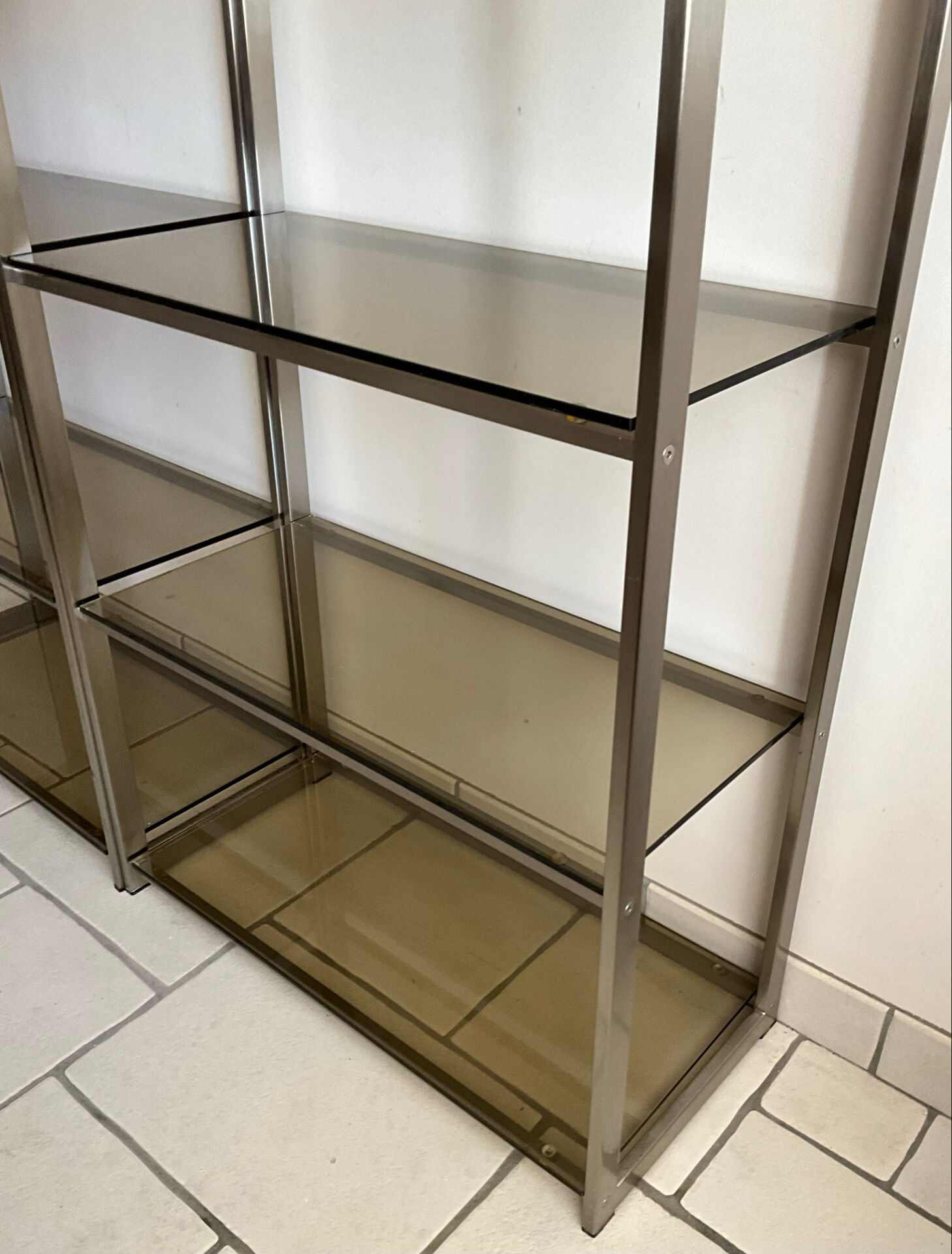 Pair of Artelano bookshelves in anodised metal and smoked glass, 1970s.