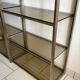 Pair of Artelano bookshelves in anodised metal and smoked glass, 1970s.