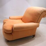 Deep seated armchair in the style of Howard & Sons