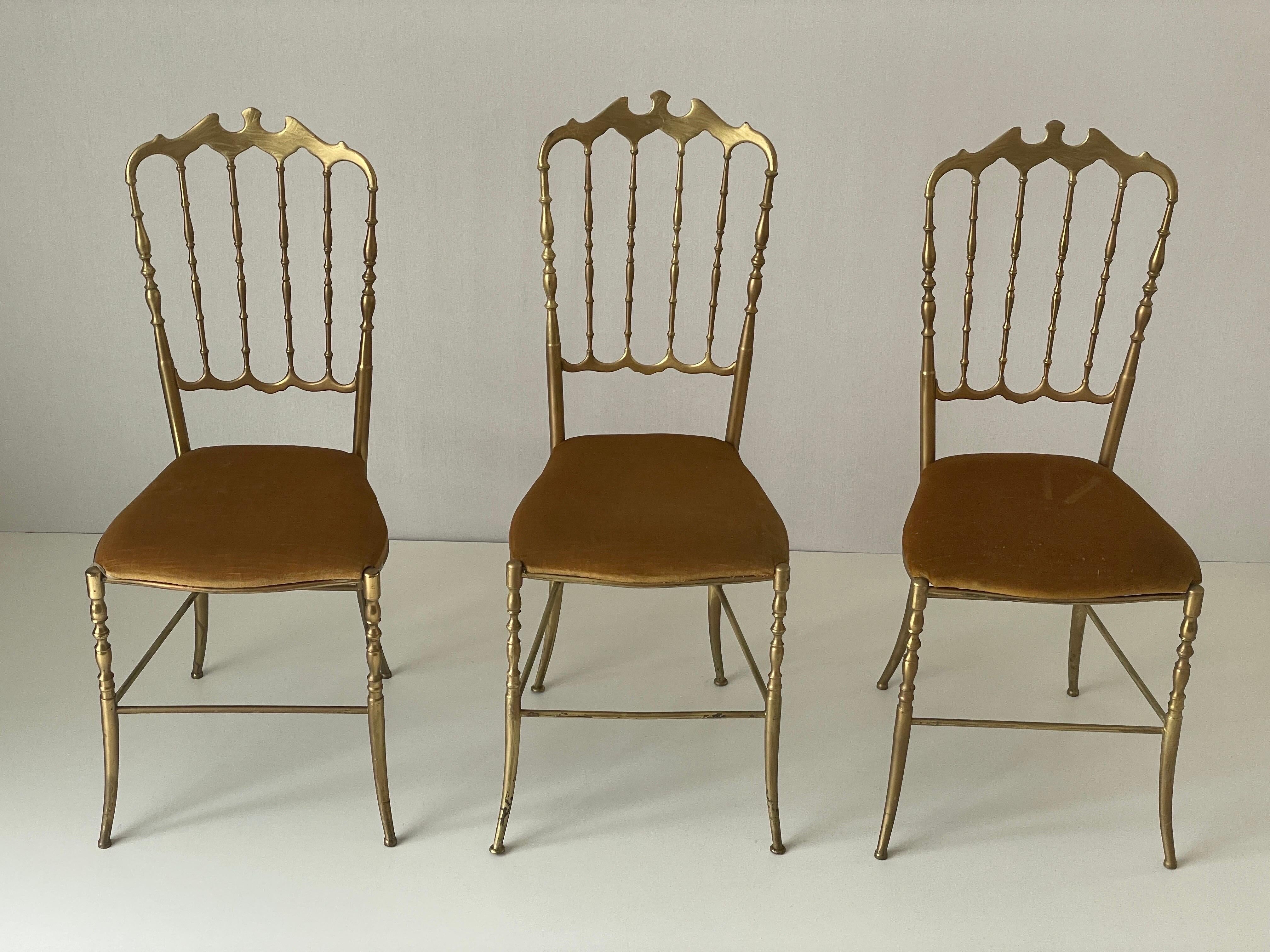 Set of 3 Chiavari chairs in brass with velvet seat and high back, 1950s, Italy.