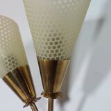 Vintage wall lamp from the 1950s in brass with flower decoration.