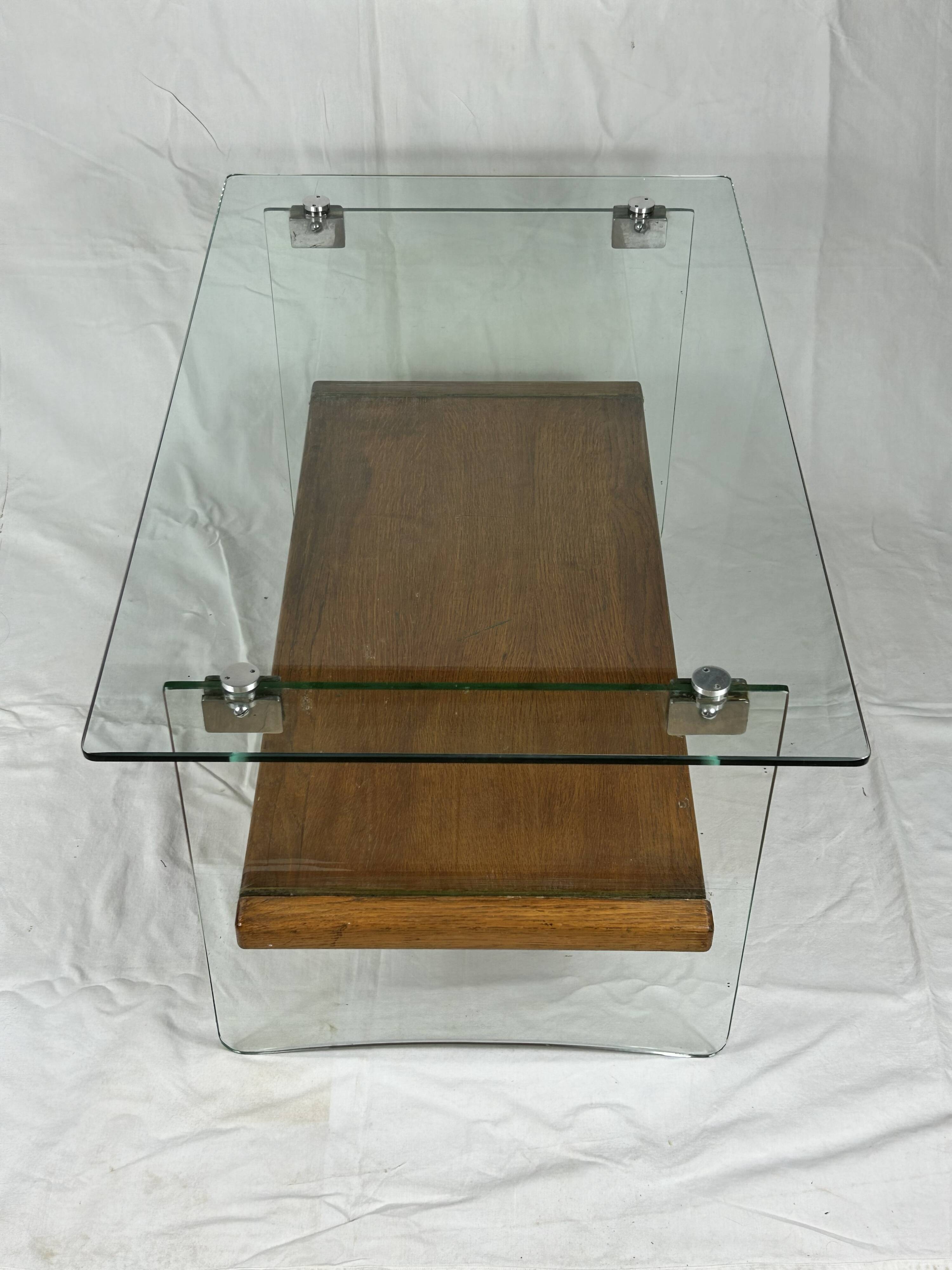 Glass coffee tables by André Monpoix