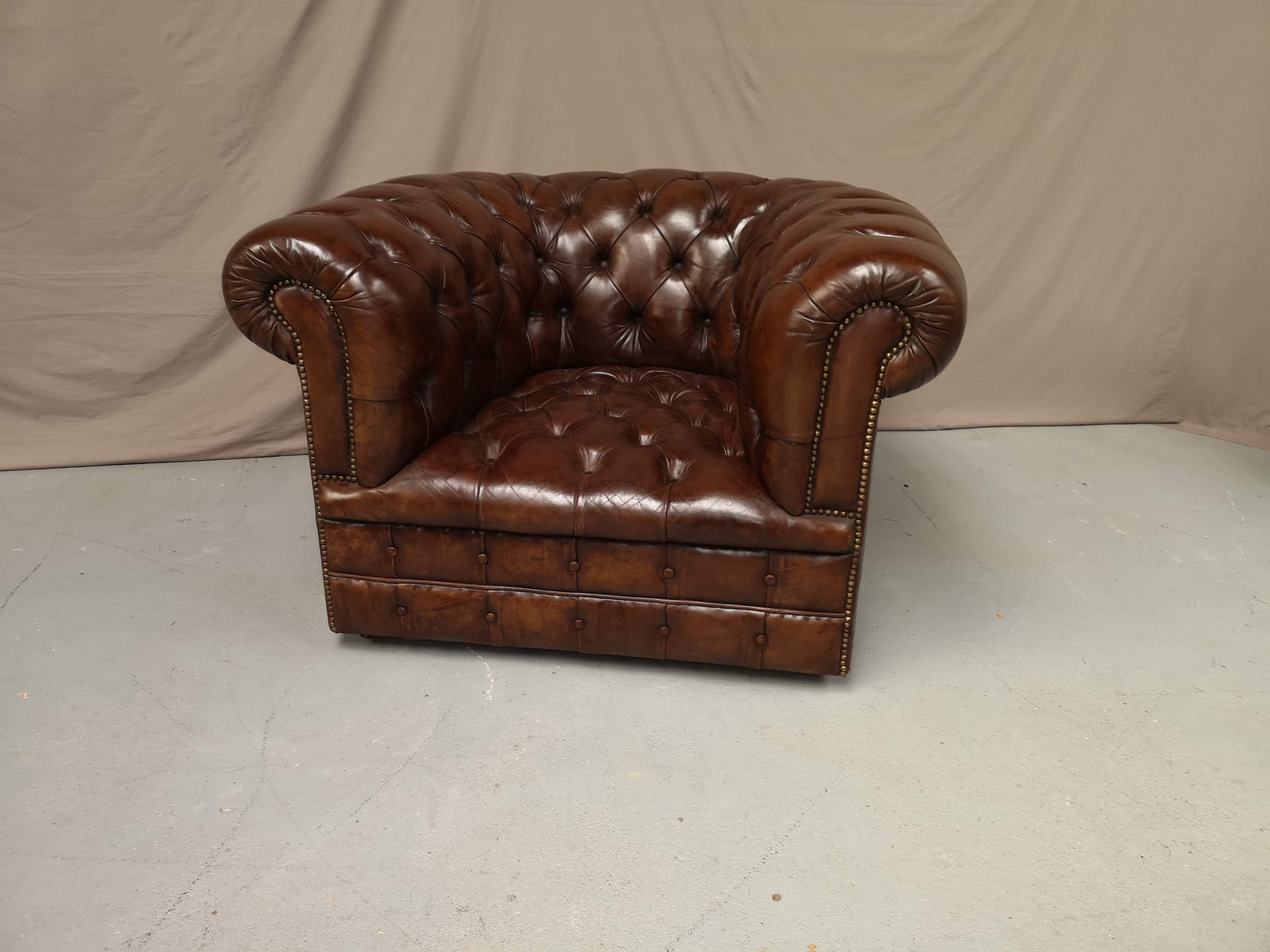 Padded Brown chesterfield armchair