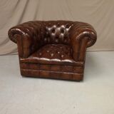 Padded Brown chesterfield armchair