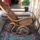 Rocking-chair with cane seating and backrest.
