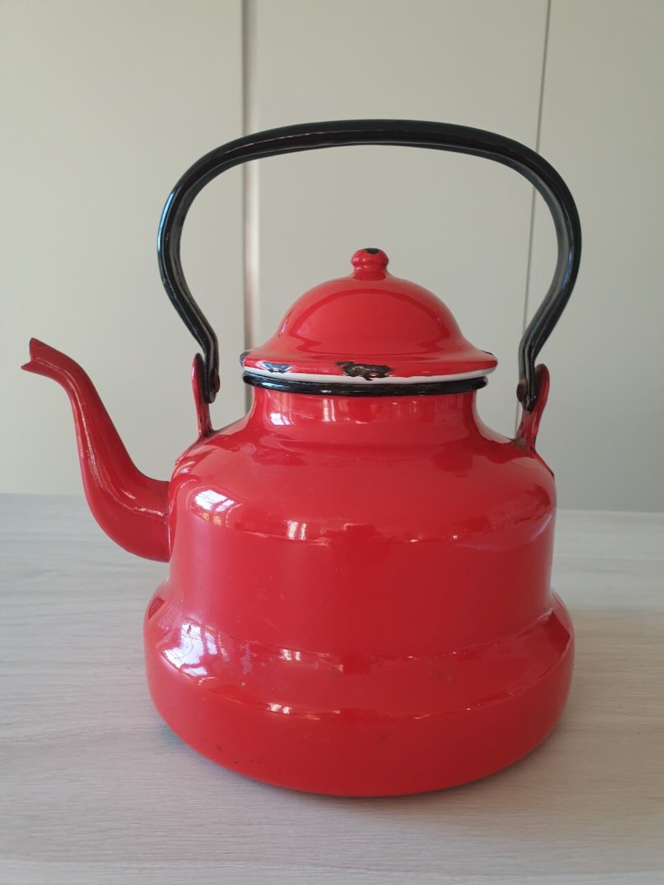 Vintage enamelled sheet metal kettle