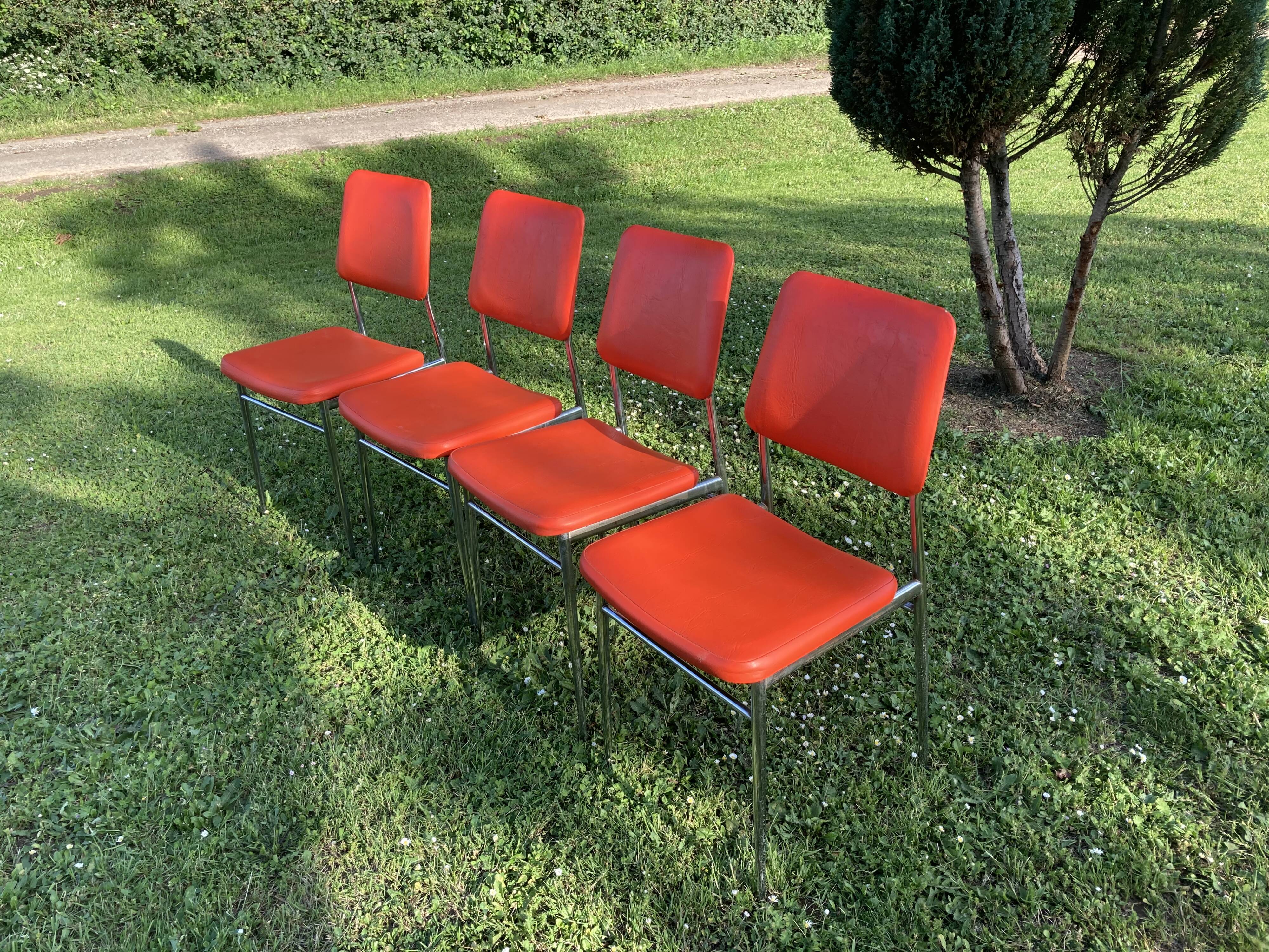 Series of 4 vintage orange chairs