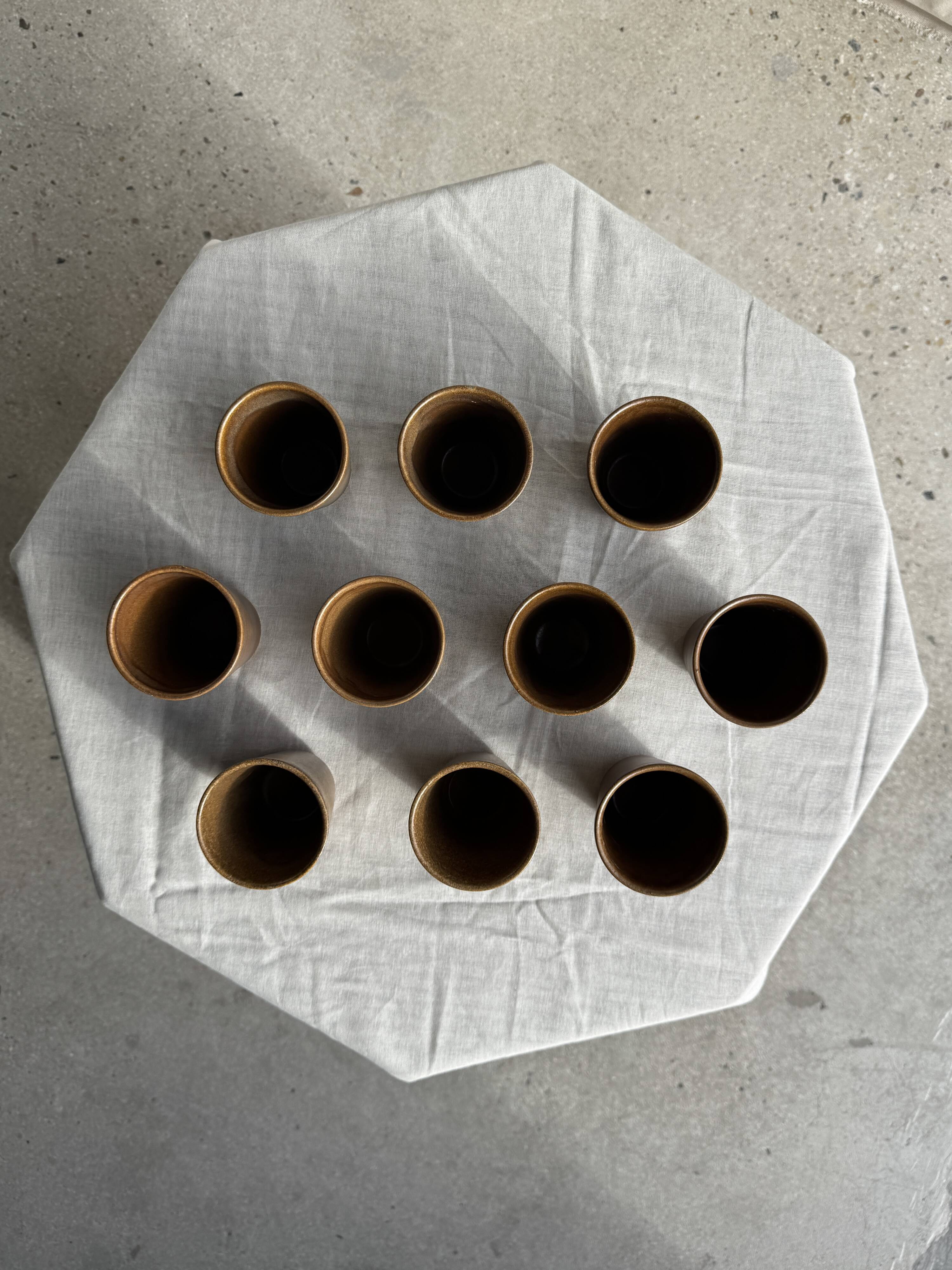 Set of 10 small stoneware mugs from Digoin.