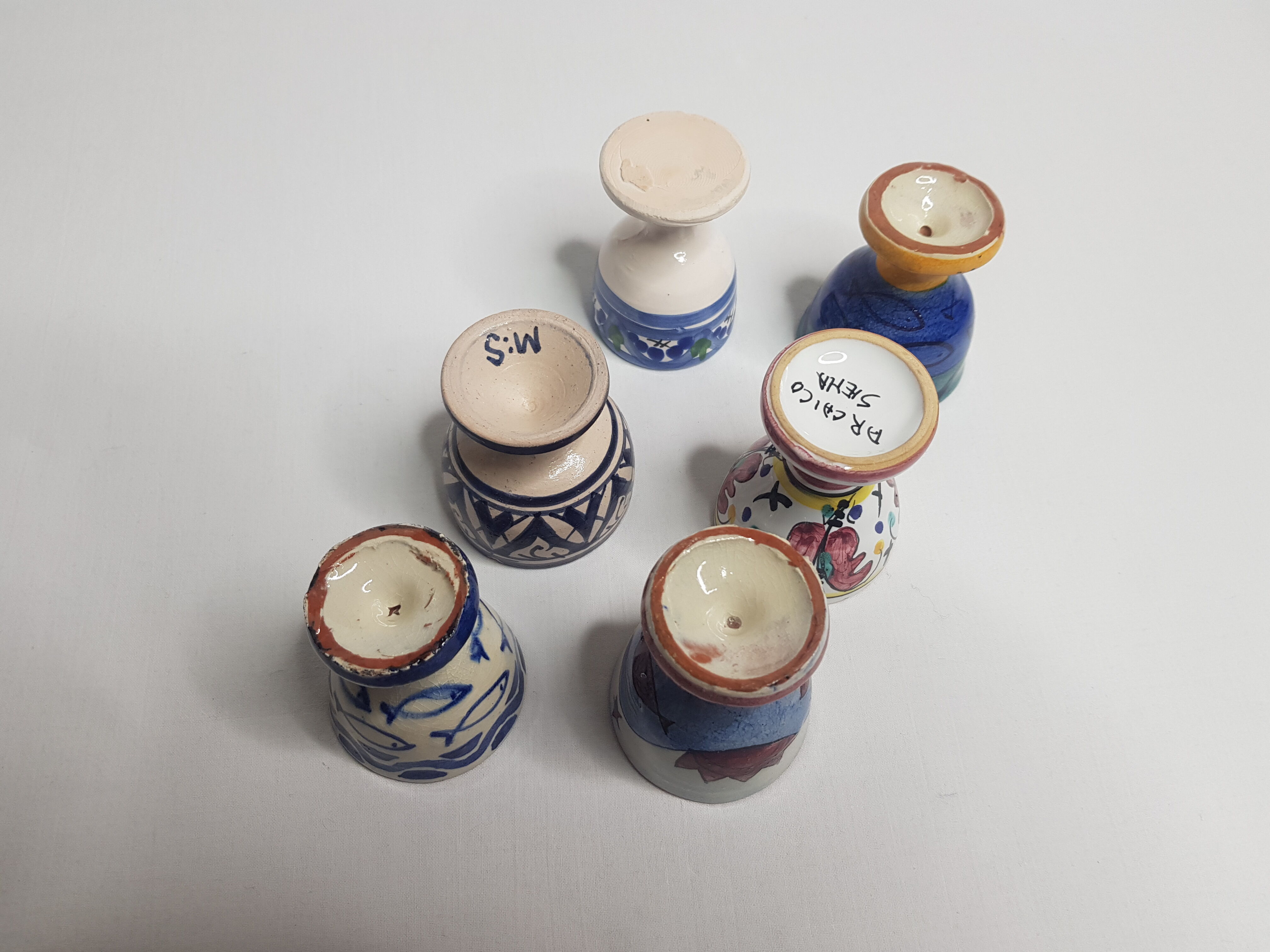 Lot of six enamelled ceramic cockroaches with Mediterranean themed decorations