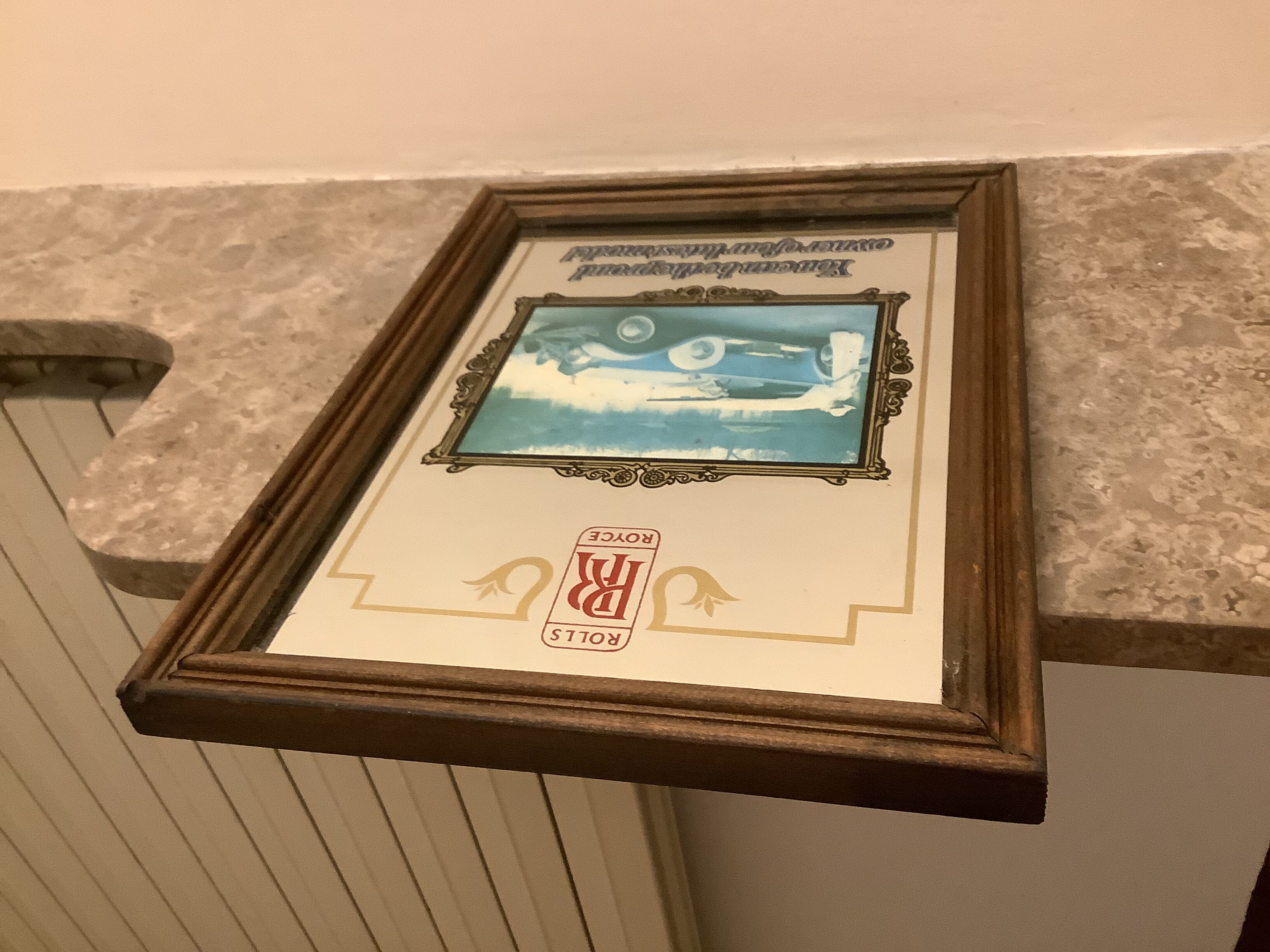 Mirror illustration of old Rolls Royce car