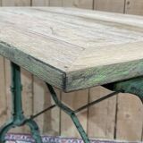 Bistro table from the beginning of the 20th century, oak top and cast iron base