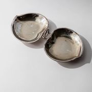 Vintage 1960s silver-plated catchall, double heart shell with ring handle.