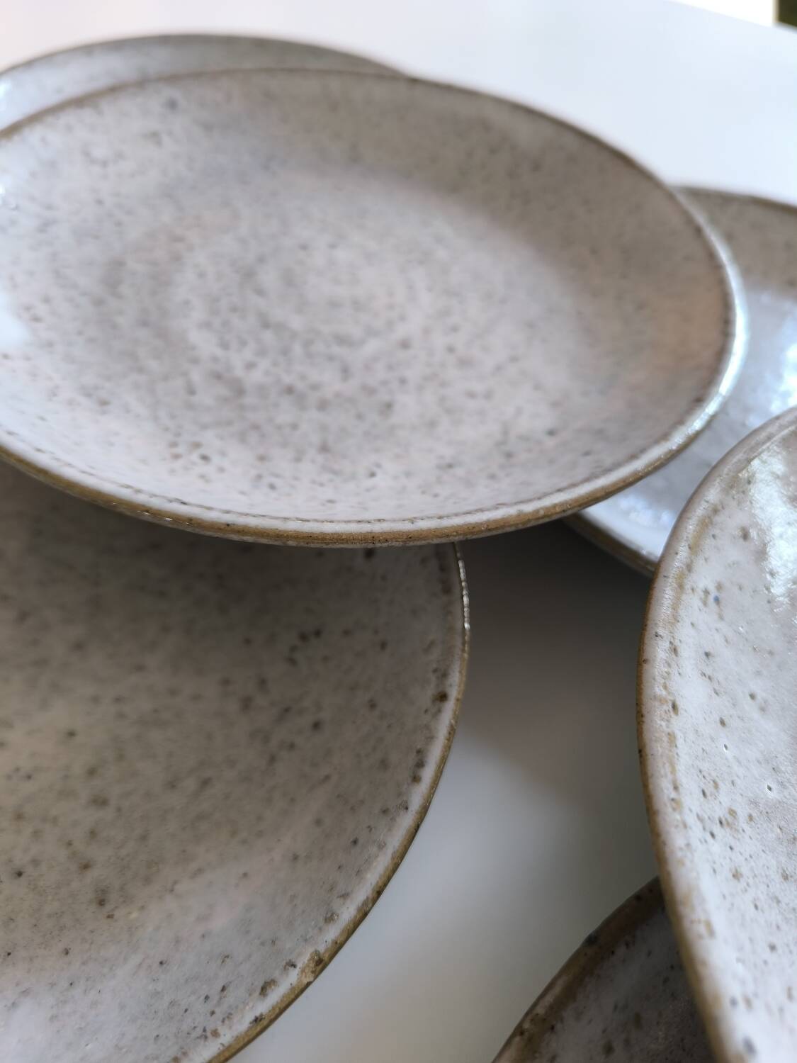 Set of six glazed stoneware plates