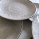 Set of six glazed stoneware plates