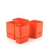 Vastill orange plastic planter by Michael McCann