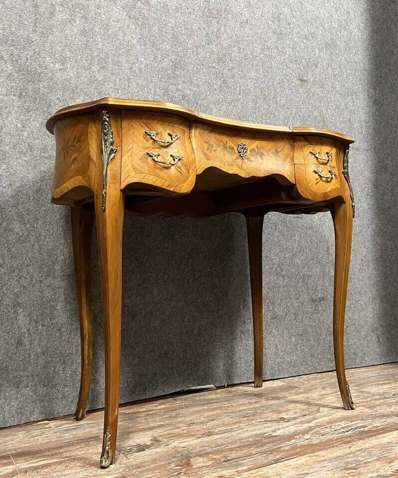 Louis XV style dressing table in "kidney" shape in rosewood decorated with marquetry flowers