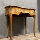 Louis XV style dressing table in "kidney" shape in rosewood decorated with marquetry flowers
